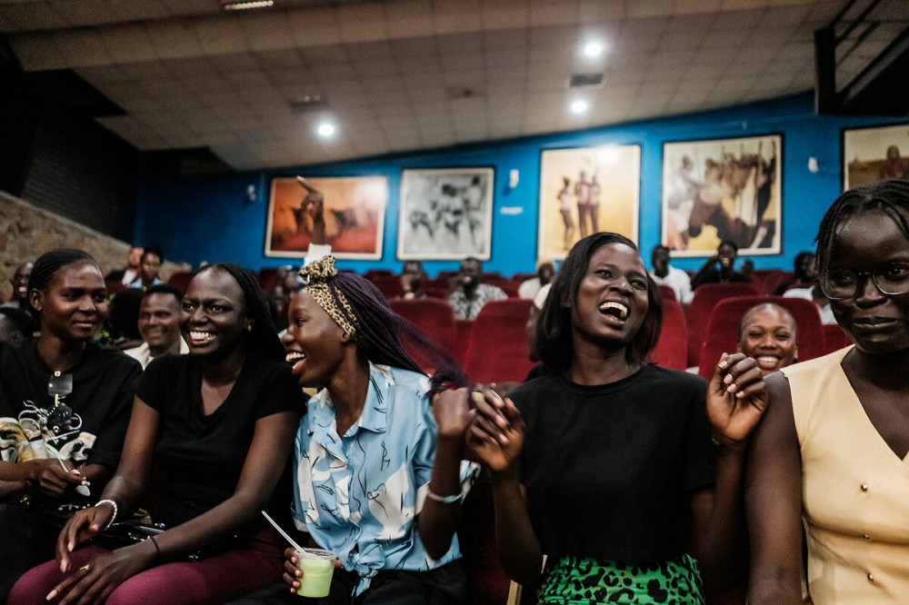Audience members react to a performance during a weekly entertainment show at Nyakuron Cultural Centre in Juba, South Sudan, Aug. 21, 2025 (Guy Peterson)