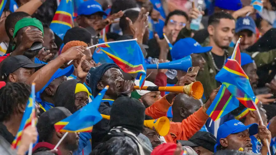 Congo supporters blow horns during a World Cup qualifying soccer match against Cameroon, Thursday, Nov. 13, 2025, in Rabat, Morocco. (The Associated Press)