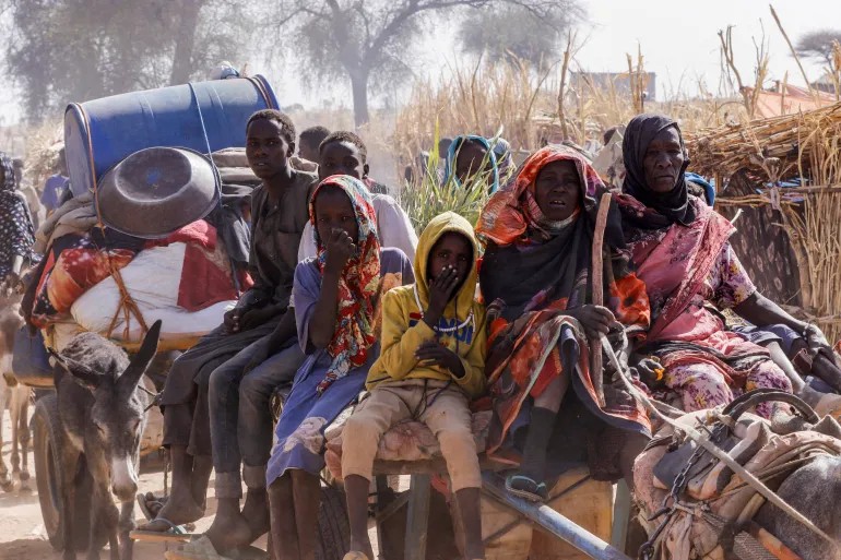 Displaced people ride an animal-drawn cart, following RSF attacks on the Zamzam displacement camp in the town of Tawila, North Darfur, Sudan, on April 15, 2025 [Reuters]
