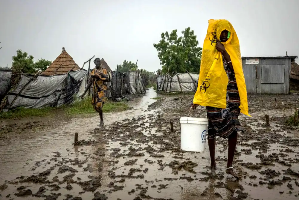 Flooding in Akobo on Wednesday. The rains turned the ground into a muddy mess (Photo Credit: Ed Ram / New York Times)