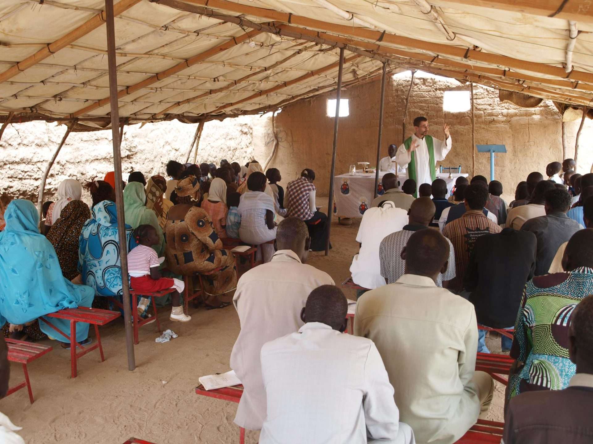 Fr Jorge Naranjo MCCJ with his community in Port Sudan. He said fighting in Khartoum had left a ‘pastoral vacuum’ in the capital (The Tablet)