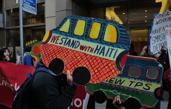 Human rights activists protest outside the US Immigration court, calling for an extension to the TPS program that 350,000 Haitians refugees are protected under in San Francisco, CA on Feb. 2, 2026 (Phil Pasquini via Shutterstock)