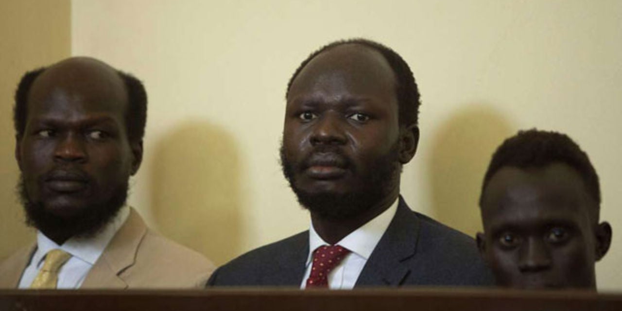 South Sudanese activist Peter Biar Ajak (centre) during his first appearance at the judiciary headquarters in Juba, South Sudan, on March 21, 2019 (File Photo)