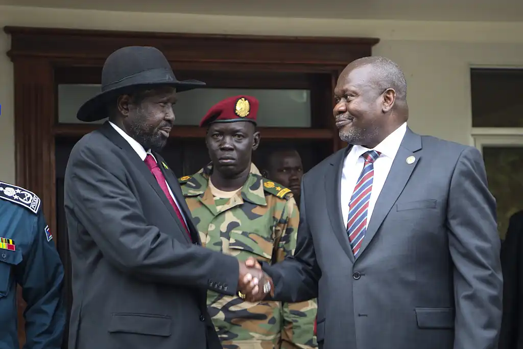 South Sudan President Salva Kiir, left, and First Vice President Riek Machar, right, shake hands after meetings in Juba, South Sudan, October 20, 2019, to discuss outstanding issues to the peace deal (FILE Photo / AP)