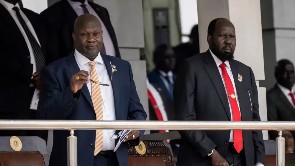 South Sudan's President Salva Kiir, right, and Vice President Riek Machar, left, attend a Holy Mass led by Pope Francis at the John Garang Mausoleum in Juba, South Sudan Sunday, Feb. 5, 2023. (AP Photo/Ben Curtis, File)