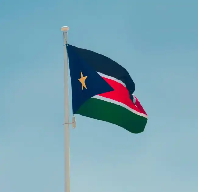 South Sudan flag (Courtesy of Aboodi Vesakaran via Unsplash)