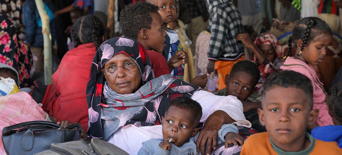 Sudan Families fleeing conflict in Sudan arrive at a transit centre in Aweil South Sudan 
