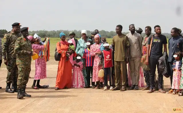UPDF Chief of Defence Intelligence and Security Maj Gen Richard Owilli Otto address some of the former LRA returnees upon arrival at Gulu Airfield in Gulu City from South Sudan on June 15 2026 (URN Photo)