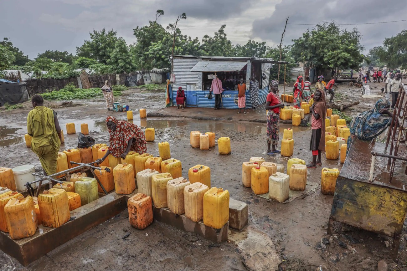 Women fetch water in Batil, Maban, South Sudan, Wednesday, Aug. 20, 2025. (AP Photo/Caitlin Kelly)