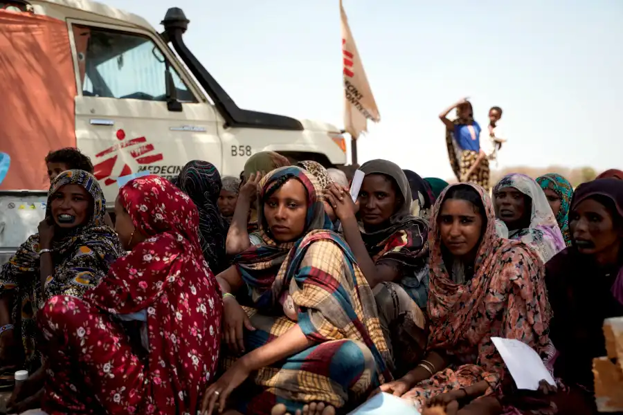 At MSF’s mobile clinic in Tebeldia, community members gather to access healthcare, including consultations, treatment and routine childhood vaccinations, after travelling from nearby remote settlements, South Sudan (© 2026 - Giulia Gustavsen Angelini/MSF)