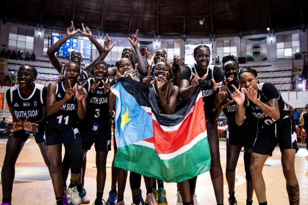South Sudan players celebrate after the win against Uganda in the 2025 FIBA Women's AfroBasket Quarterfinals (Credit: FIBA)