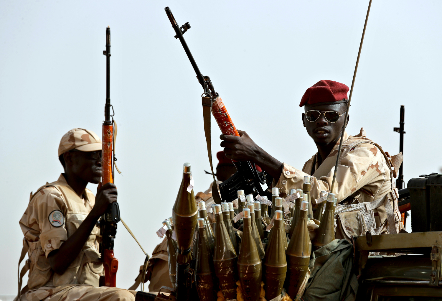Sudanese soldiers from the Rapid Support Forces unit, led by Gen. Mohammed Hamdan Dagalo, the deputy head of the military council, secure the area where Dagalo attends a military-backed tribe’s rally, in the East Nile province, Sudan, June 22, 2019. (AP Photo/Hussein Malla, File)